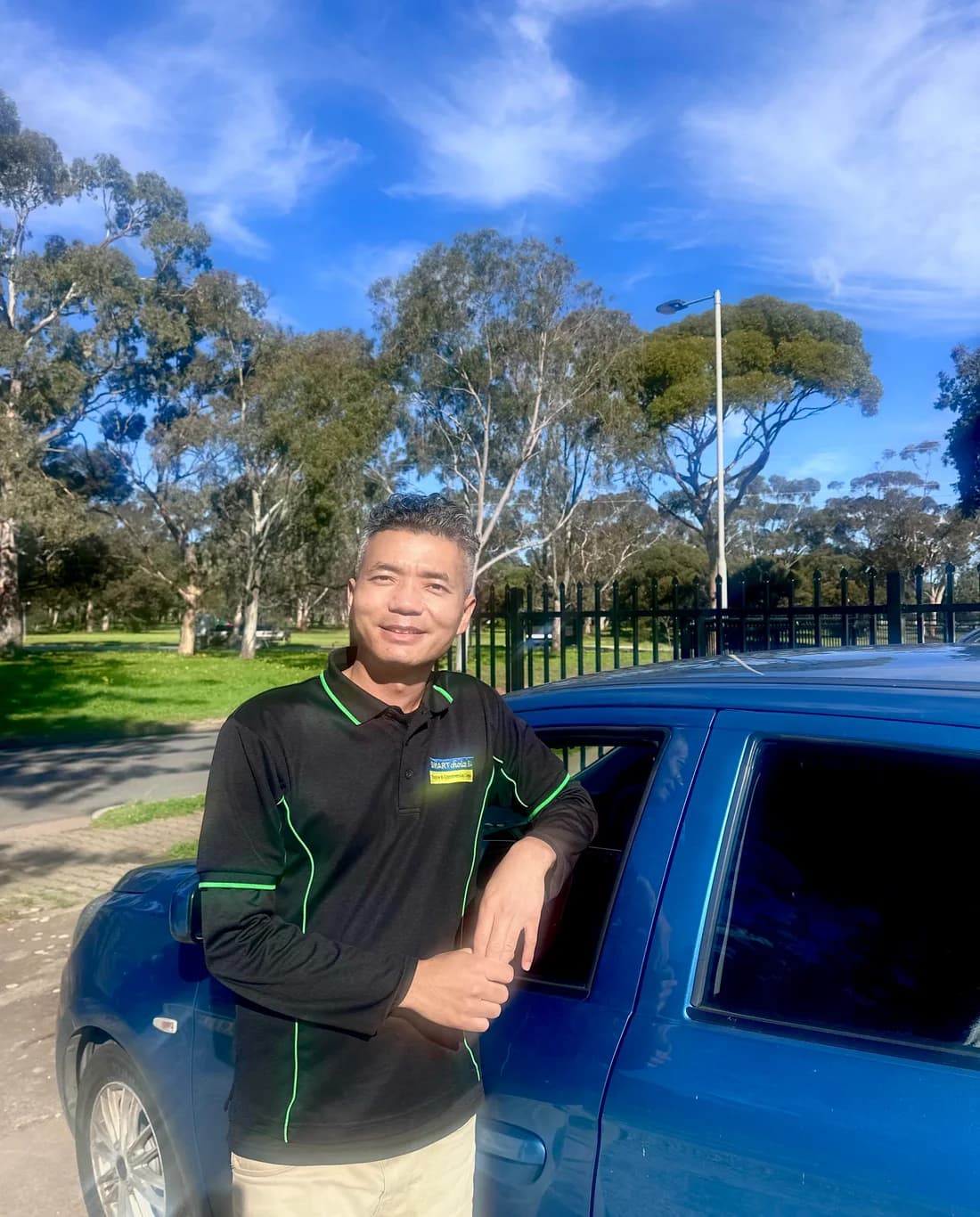 Nathan, the owner of SMARTchoice SA, beside his work vehicle in Adelaide